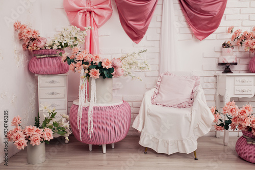 the interior of the room of a teenage girl who loves pink and fluffy bows. Flower vases made of environmentally friendly plastic, wooden dressers with aristocratic moldings