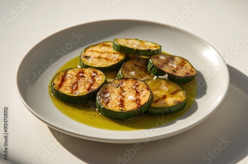 Wallpaper Mural Warm light grazes grilled zucchini as green oil glistens across crisp charred edges Torontodigital.ca