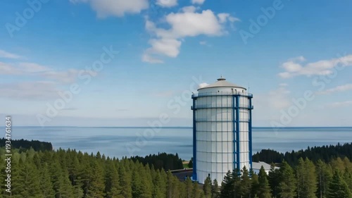 Water Tower in Forest Landscape Scene.