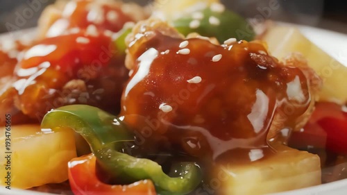 Close up of a prepared dish with vegetables and sauce