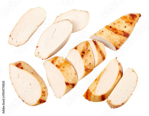 Sliced grilled chicken breast pieces arranged on transparent... isolated on a transparent background