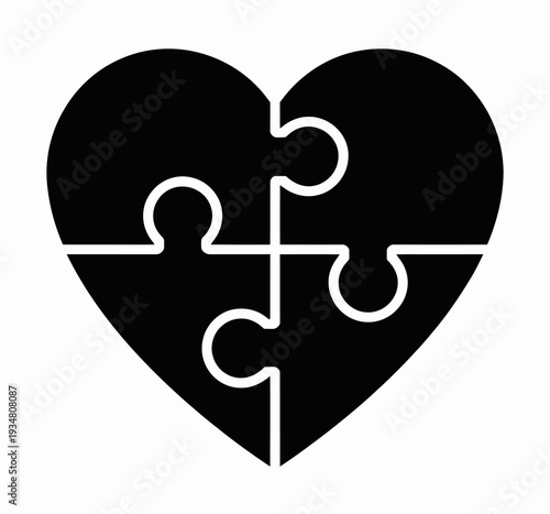 A black puzzle in the shape of a heart sits against