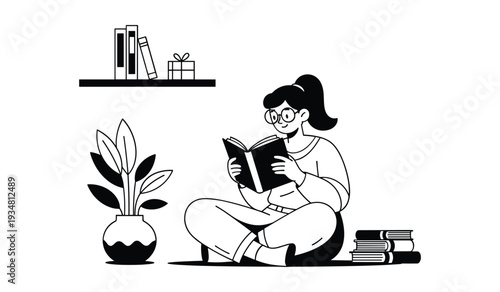 Woman in glasses sitting cross-legged reading a book beside a potted plant and bookshelf