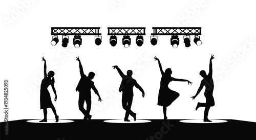 Dancers performing on stage under bright spotlights a dark silhouette