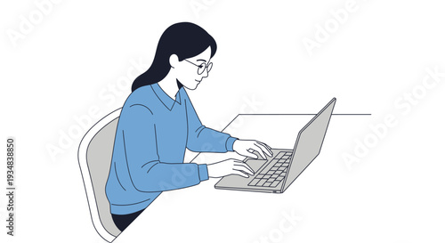 Woman sits on chair typing on laptop indoors with blue shirt on