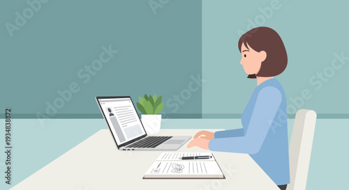 Woman working on laptop and documents at a desk in a calm office environment