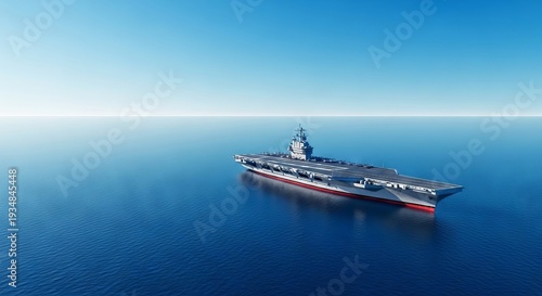 A solitary aircraft carrier glides across the immense, tranquil blue ocean under clear skies. A powerful vessel on an endless sea, water, ocean, ship