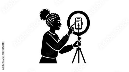 Black flat silhouette icon of a woman with braided hair using a smartphone and ring light, representing influencer marketing, content creation, vlogging, and online broadcasting.