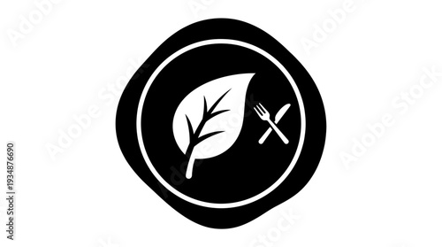 Black circular icon with a leaf and cutlery, signifying vegetarian or vegan food choices, healthy eating, and sustainable dietary practices.