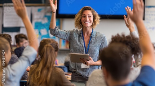 Happy Female Teacher with Tablet Leading Class with Hands Raised