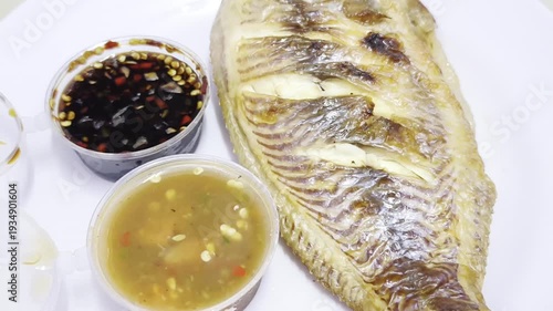 Grilled fish with dipping sauces