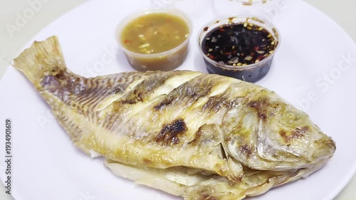 Grilled fish with dipping sauces