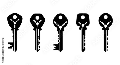 Set of five black silhouette keys isolated on a white background.