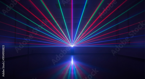 Colorful laser light show beams radiating outwards from a central point.