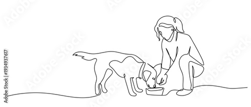 One continuous line outline of a woman sitting and feeding a dog. Editable stroke.