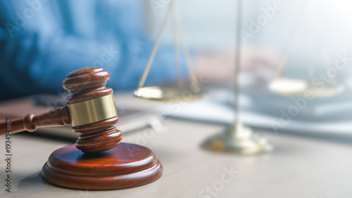 Tableau sur toile Judge gavel and justice scale on desk in law office, representing legal system, court decision, litigation process and professional legal services concept