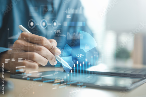 Billede på lærred Business professional using tablet with digital analytics dashboard, charts and data visualization, representing business analytics, financial analysis and digital strategy performance concept