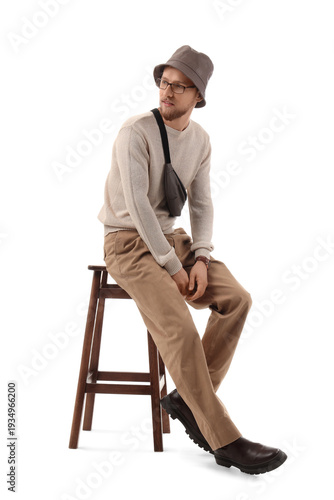 Stylish young man in bucket...