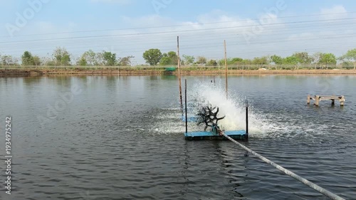 The water pump is working in the fish pond.
