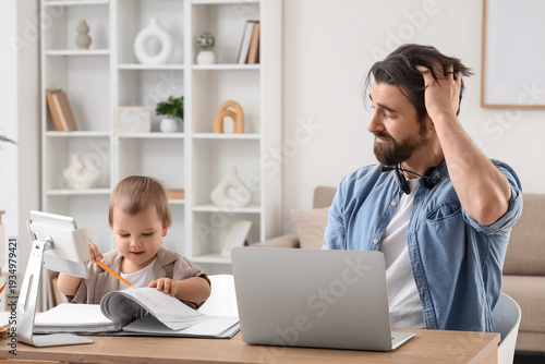 Little baby boy drawing in ...