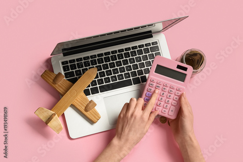 Female hands with laptop an...