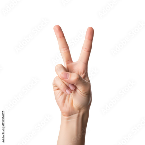 Human hand making the peace sign with two fingers raised
