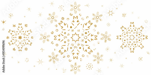 Delicate golden floral and star patterns scattered on a cream background