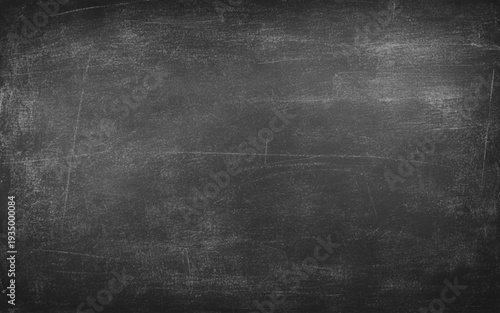 Blackboard or chalkboard photo. Black Blank Chalkboard Background. A messy, black chalkboard with texture marks.