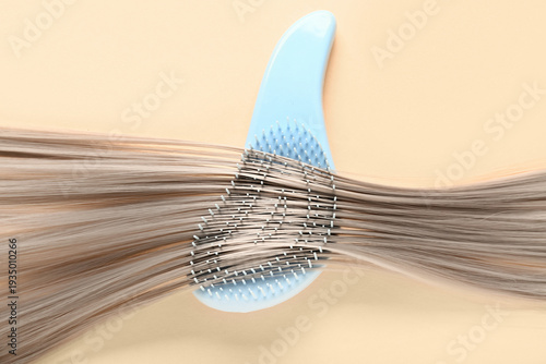 Grey hair strand with brush...