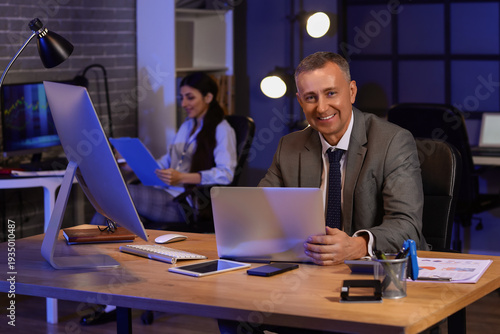 Male business analyst worki...