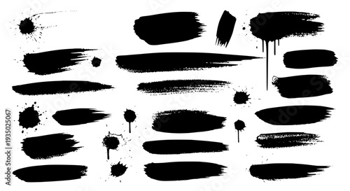 Brush strokes set with black paint splatters and smudges featuring grunge, texture, abstract with art and design