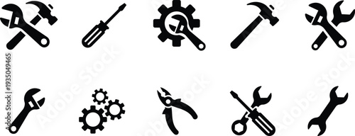 Black and white silhouette of various tools and equipment