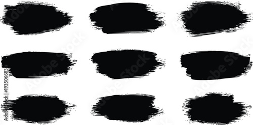 A collection of nine black ink brush strokes on a white background