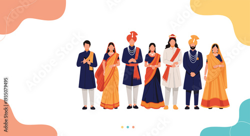 Group of men and women stand together wearing elegant and colorful traditional Indian wedding or festive clothing.