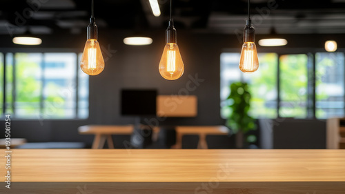 Warm hanging light bulbs, wooden table, blurred modern office background, cozy atmosphere
