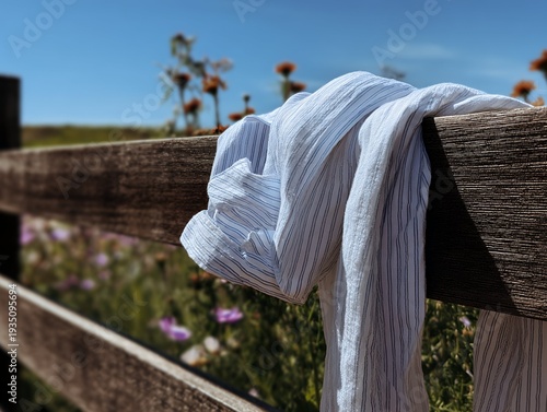 Shirt on Wooden Fence with Flower Field