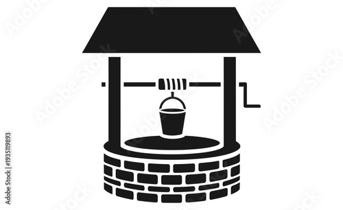 Simple black and white icon depicting a traditional water well structure with a raised bucket ready for drawing fresh subterranean water supplies for domestic use.