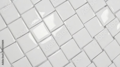 Shiny white square tiles in a grid pattern