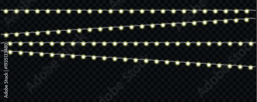 Illuminated string lights with glowing white and green bulbs cascade across a transparent dark background high-quality