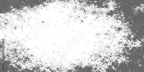 A dark vintage grunge background featuring black ink splashes and a dirty paint texture on an old paper pattern with a dusty vector border frame