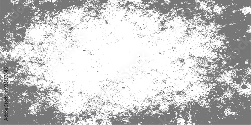 Abstract black and white grunge background featuring a textured wall pattern with artistic ink splashes and liquid paint drops on an old dirty surface