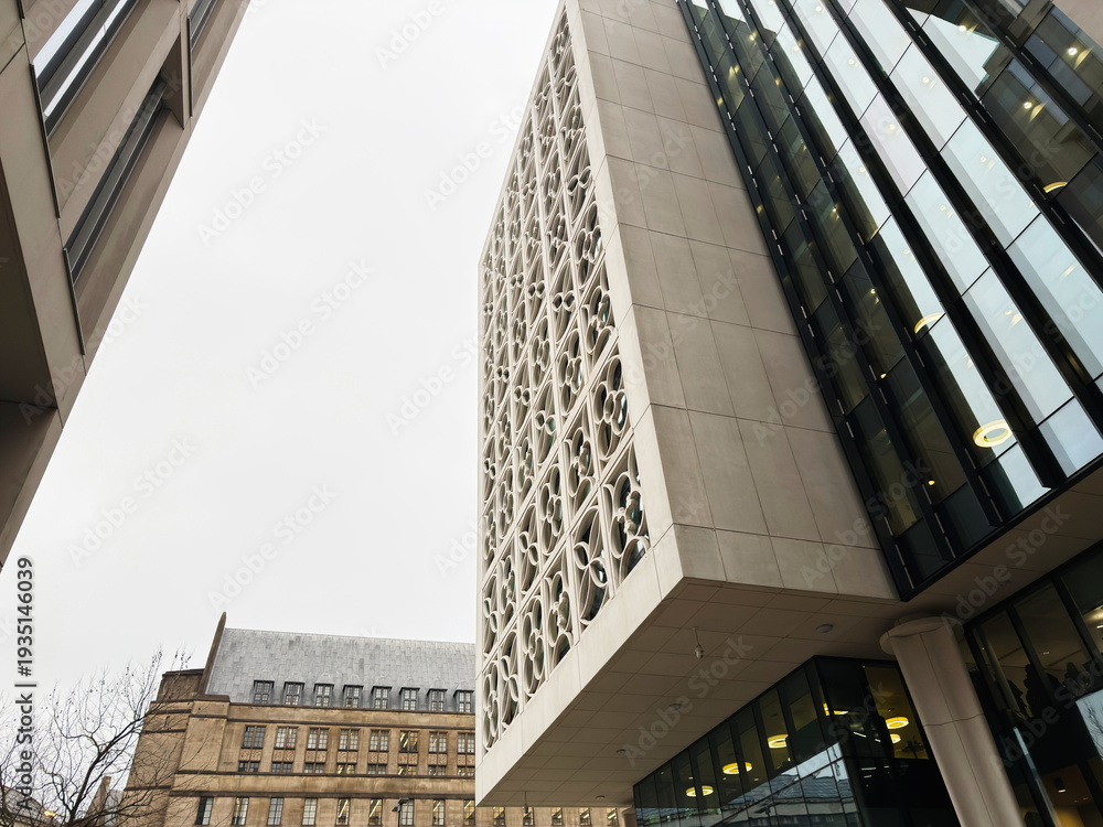 Fototapeta premium Modern glass and circular facade building in Manchester city centre for a contemporary office image
