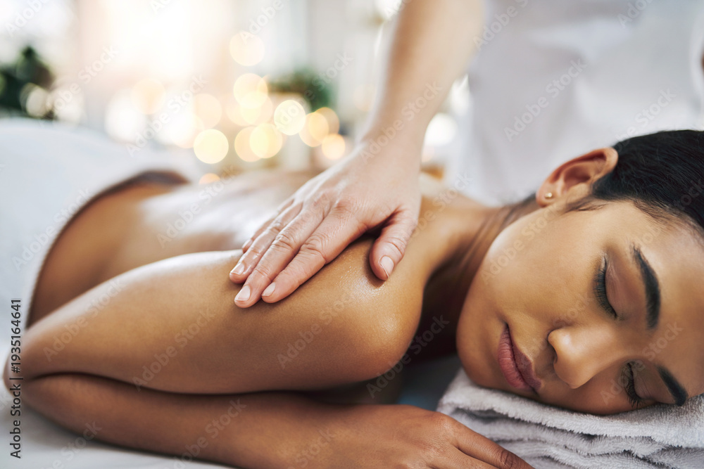 Obraz premium Woman, relax and back massage with masseuse at spa for stress relief, muscle healing and pamper. Hands, people and physical therapy with bokeh, skincare treatment and therapeutic session for wellness