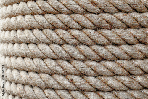 Close up twisted jute rope strands showing coarse fibers