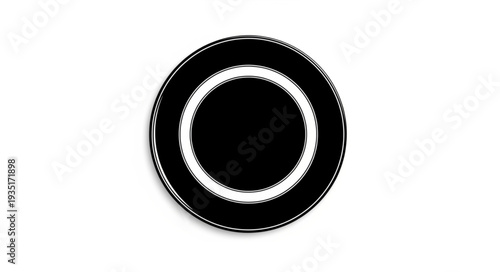 Black plate with a white ring, perfect for serving delicious meals, isolated.