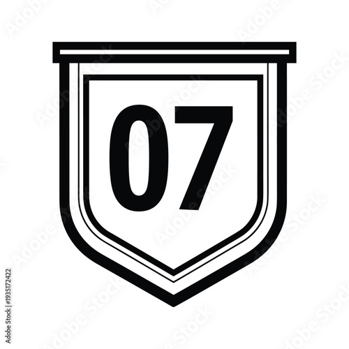Black and white shield with the number 07 displayed prominently inside it