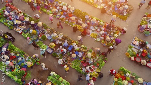 Aerial view of busy local daily life of the morning local market in Vi Thanh or Chom Hom market, Mekong Delta, Vietnam.