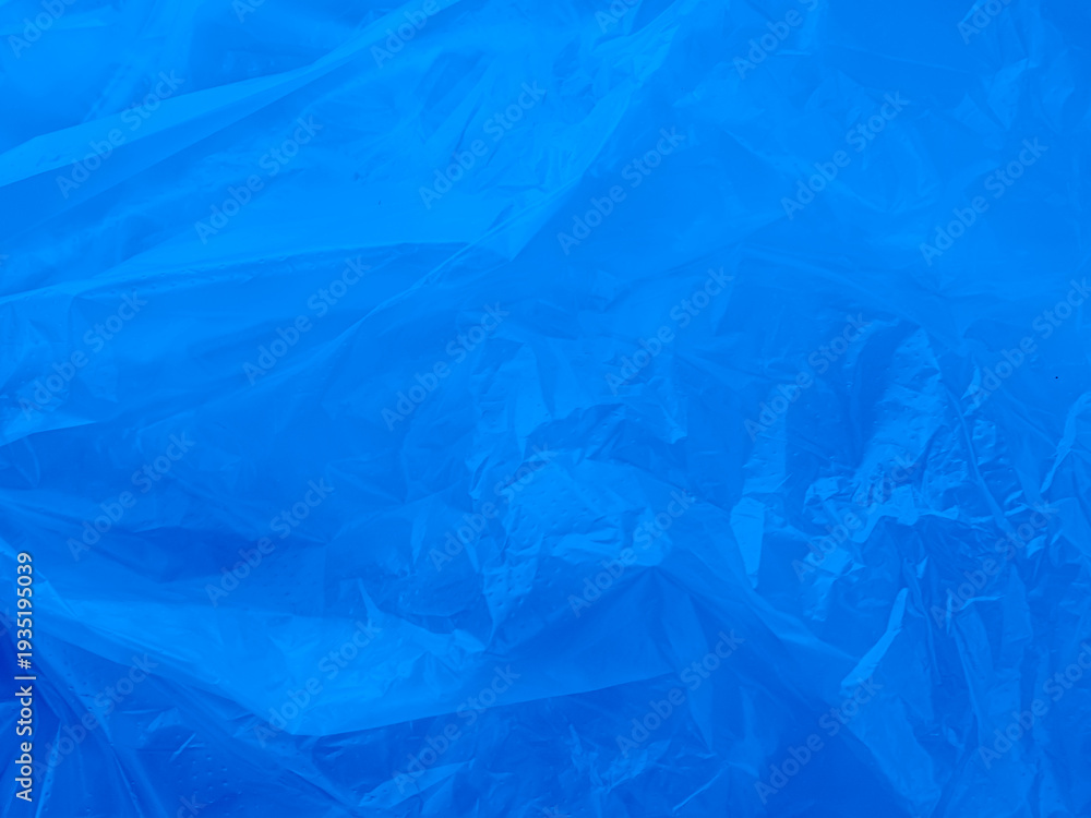 Obraz premium Abstract background plastic bag blue vacuum cling foil wrinkle texture wall crumpled film foil overlay seal wrap polyethyene packaging frame material industry wrinkle template ecosystem environment