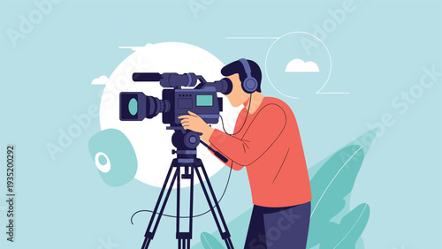 Professional videographer wearing black headphones and operating a large movie camera mounted on a tripod in a modern studio.