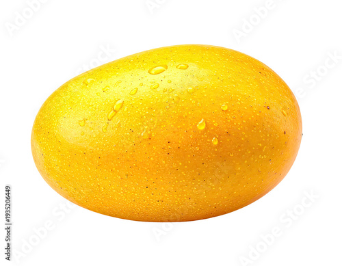 A bright yellow fruit, glistening with water droplets, on a black background